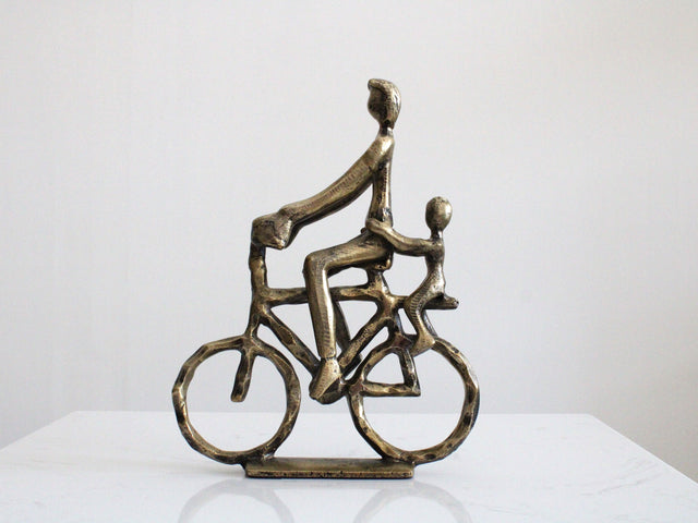 Escultura Ciclista color dorado