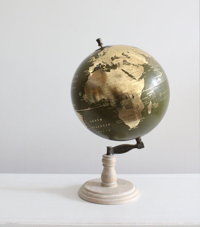 Bola del mundo dorada